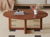 A natural and elegant deep red wooden coffee table with artificial rattan decorations, perfect for a W1151140563