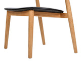 Raven 20.5" Stacking Sculpted Oak Wood Dining Chair, Warm Natural Brown & Black Faux Leather B2719P238276