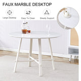 A modern minimalist circular dining table with a 42 inch diameter white patterned tabletop and white W1151P152778