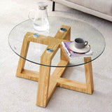 Modern practical circular coffee tables. Made of transparent tempered glass tabletop and wood W1151P146796