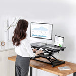 ZUN Height Adjustable Standing Desk 31.3” Wide Sit to Stand Converter Stand Up Desk Tabletop Workstation 26899938