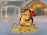 2.2FT Lighted Penguin Riding Sleigh Christmas Decorations, Pre-lit Holiday Decor with 130 Warm White 67325185