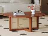 A natural and elegant deep red wooden coffee table with artificial rattan decorations, perfect for a W1151140563