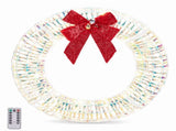 24 in Pre-Lit Iridescent Christmas Wreath with 110 Warm White LED Lights, Red Bow and 05296603