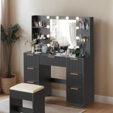 Black particleboard with a melamine finish, 7 drawers, 4 shelves, a dressing table set with 10 69112005