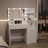 The white vanity with a mirror is equipped with a hair dryer rack, while the vanity in the bedroom W1320P186705