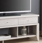 ZUN Modern TV Stand with Three Open Shelves and Three Drawers - White B107131393