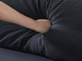 The 53-inch black sofa offers a spacious layout in the small apartment, easily handling various W3371P309476