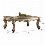 ZUN Gold Patina and Bone Coffee Table with Scrolled Leg B062P209126