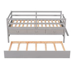 ZUN Low Loft Bed Twin Size with Full Safety Fence, Climbing ladder, Storage Drawers and Trundle Gray WF312991AAE