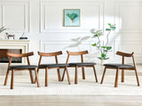 2 walnut colored solid wood dining chairs, with black PU soft cushions and curved backrests that fit W1151P436187