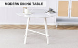 A modern minimalist circular dining table with a 42 inch diameter white patterned tabletop and white W1151P152778