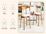 2 walnut colored solid wood dining chairs, with white PU soft cushions and curved backrests that fit W1512P510307