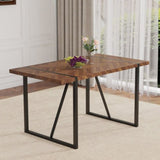 A minimalist retro rectangular dining table with a specially textured top and black metal W1151P240748