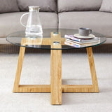 Modern practical circular coffee tables. Made of transparent tempered glass tabletop and wood W1151P146796