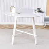 A modern minimalist circular dining table with a 42 inch diameter white patterned tabletop and white W1151P152778