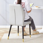 ZUN 4 light gray modern dining chairs with stylish PU patterned backrest and black metal legs for a W1151P188264