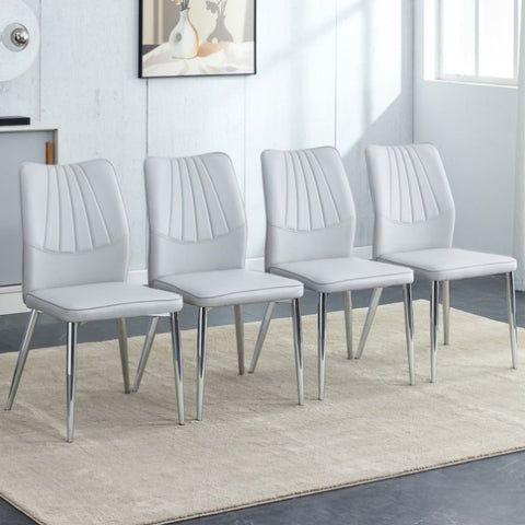 ZUN Four light gray dining chairs. A medieval modern chair made of PU material with soft cushions and W1151135519