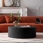 ZUN Sleek and Modern Round Coffee Table with Eye-Catching Relief Design, Black W87676996
