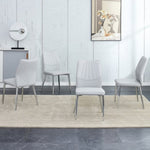 ZUN Four light gray dining chairs. A medieval modern chair made of PU material with soft cushions and W1151135519