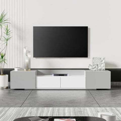 ZUN Modern TV Stand for 70" TV with Large Storage Space, Magnetic Cabinet Door, Entertainment Center for WF303617AAE